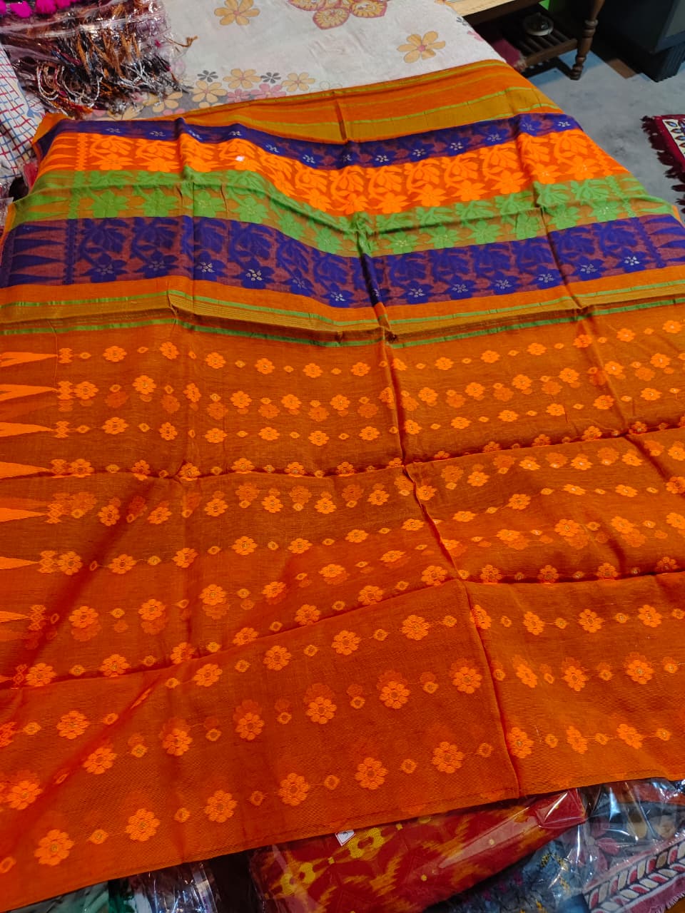 Soft Jamdani  with BP (orange body with yellow floral motifs, a blue and green contrasting border)